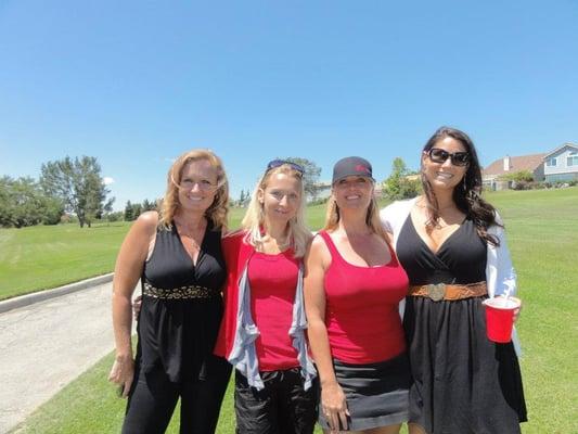 Raquel & Lana with their two sister in-laws, working a charity golf tournament!