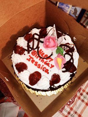 Chocolate sponge cake with cherry filling (top of cake view)