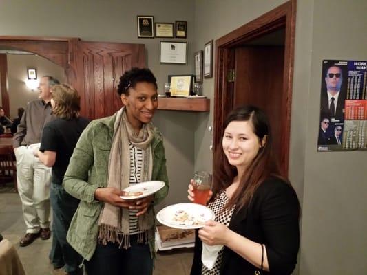 Ashley and Onotse enjoying the West Region of the 2014 March Madness #YelpPizzaBracket in the bier stube of Capital Brewery