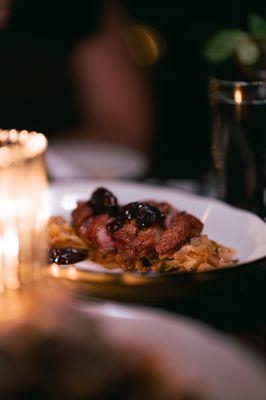 Roasted Duck Breast - cherry gastrique, togarashi, brown butter cabbage