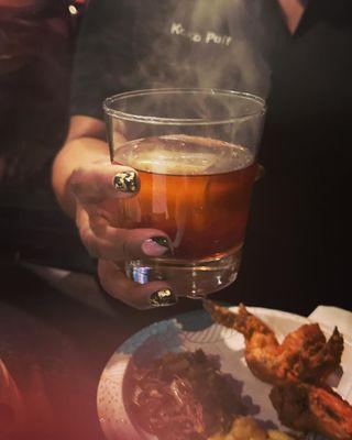 Our Signature drink, "Smoked Old Fashioned"