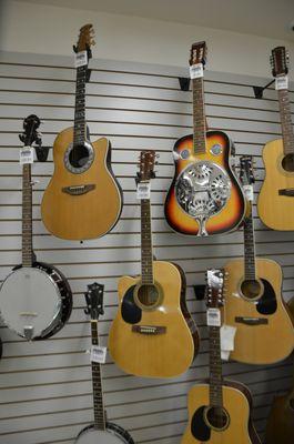 Guitars and Banjos are just a few of the musical instruments we have.