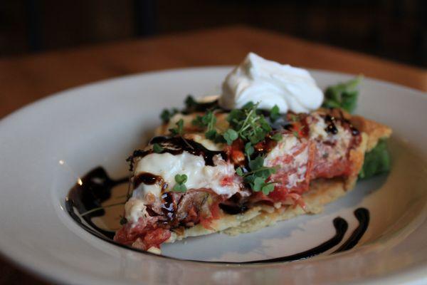 INDIANA TOMATO PIE
summer tomatoes, parmesan cheese, sour cream, chives, & balsamic syrup