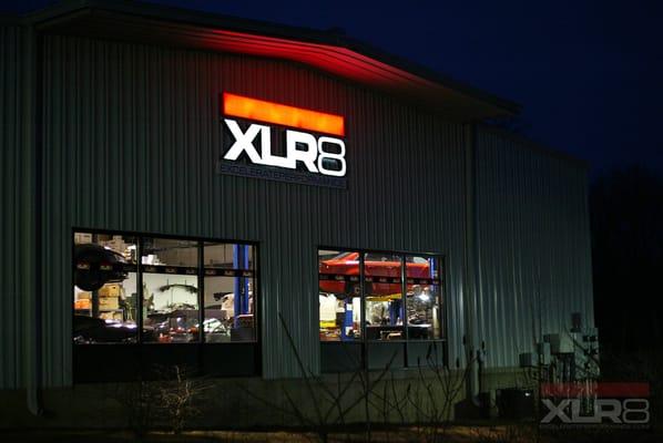 XLR8 Shop Front at Night