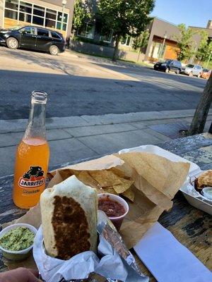 Classic Carnitas Burrito Chips & salsa  Jarritos Mandarin