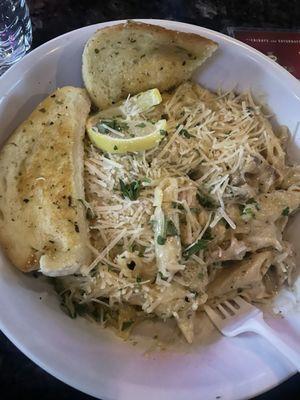 My food. Jerk chicken pasta with garlic bread so amazing. And only $12 bucks!!