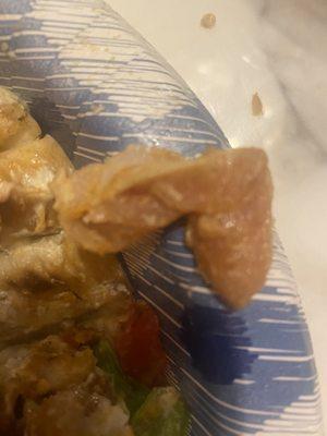 Raw chicken found in my Chicken Gyro Pita Sandwich