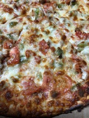 Thin Crust XL Pizza with Italian Sausage, Tomatoes, Onions, and Peppers (close up!)