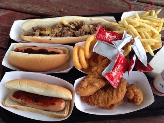 Cheesesteak, dogs, o rings, fries and chicken fingers.