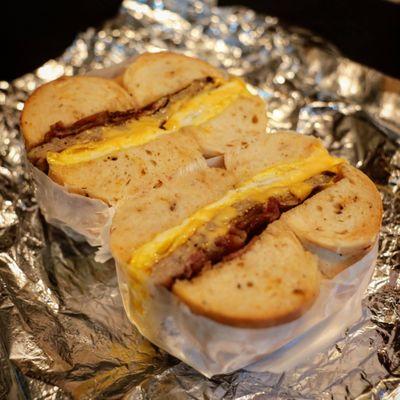 Bacon, Sausage, Egg, and cheese on a sundried tomato bagel