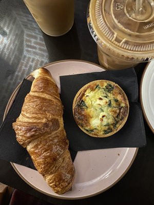 Croissant, latte, and a spinach and goat cheese quiche