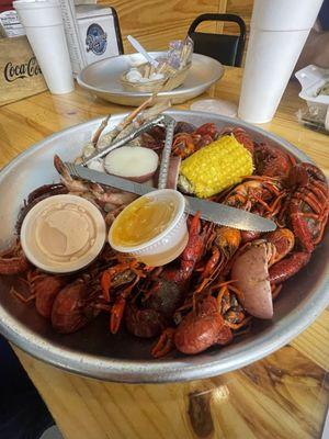 Half a Dungeness crab, Shrimp, Crawfish, corn and potatoes.