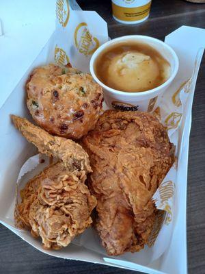 Spicy white chicken, jalapeño biscuit and mashed potatoes and gravy