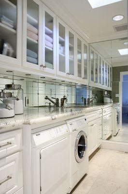 A gorgeous upscaled laundry room.  We love working with our clients to make their design dreams come true.