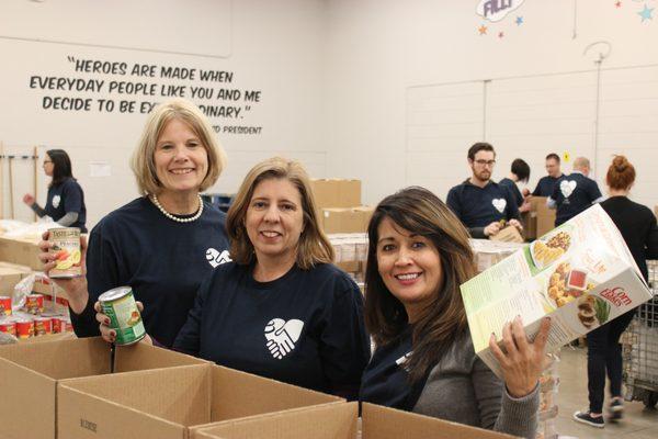 Volunteers help us sort food, pack senior boxes and fill orders in our warehouses. We love our volunteers!