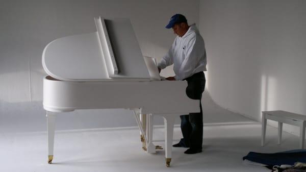 Checking piano after delivery for wedding