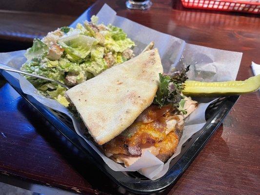 Turkey Bacon and Sharp Cheddar with cranberry infused mayo woodfired sandwich&Caesar salad and very fresh crisp garlicky pickle wedge