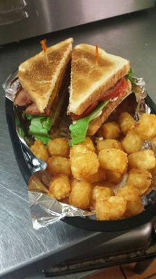 Club Sandwich served with Tator Tots. ......