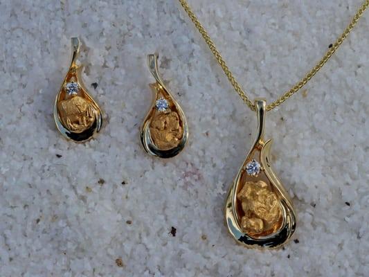 14Kt yellow gold matching earrings and pendant with natural Alaskan gold nuggets and diamonds. Hand made in our shop.  GRE121D & GRP317D