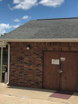 Before & After roof treatment picture.  Check out the segment in the lower left of this roof.