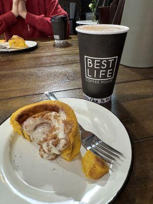 Chai and half of a pumpkin cinnamon roll!