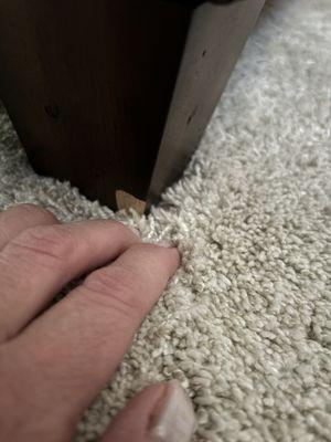 Wood missing from door of sofa