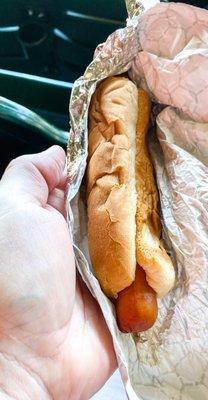 This is what $8.25 buys . . . an average sized wiener and a shriveled bun. Why?!