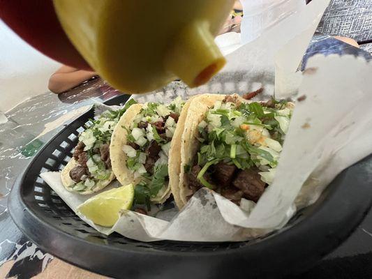 Steak tacos with it sauce