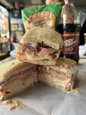 Turkey, corned beef, & pastrami sloppy joe