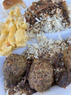 Meatballs with oxtail sauce, rice and Mac & Cheese.