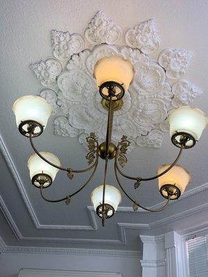 Very Victorian waiting room - gas light design fixture!