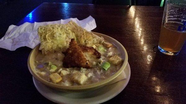 Kick ass clam chowder, with toasted garlic bread hanging off the side and a piece of panko cod swimming laps in the middle.