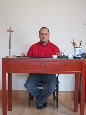 Sifu at his calligraphy table