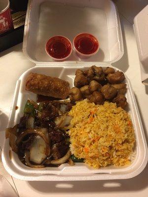 D2 pepper steak, rice, egg roll and sweet and sour pork, sauce on the side