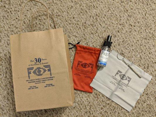 Complimentary swag bag of the eyeglasses cleaning/repair kit