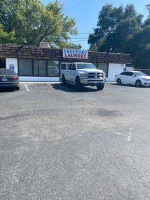 Truck engine running while the exhaust fumes go inside store