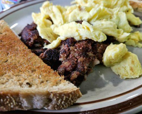 Corned beef n hash . ( burnt )