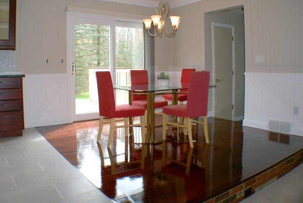 Kitchen floor refinished, high shine, cherry color.