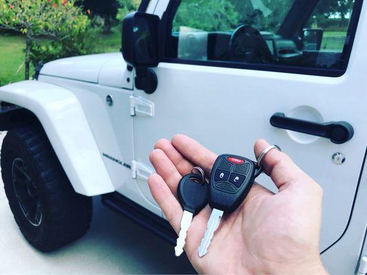 Customer lost all keys; Lockhart Locksmith provided customer with new spare key and remote for 2016 Jeep Wrangler.