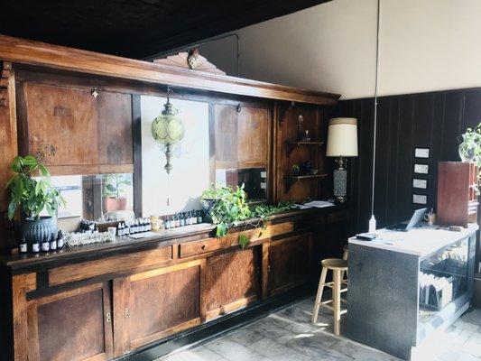 Our front desk with vitamins, supplements, and herbal tinctures