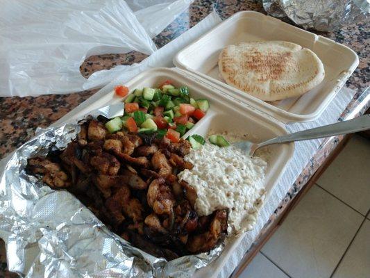 Chicken shawarma and rice, Israeli salad, pita bread, and baba ganoush... big portion and very tasty!