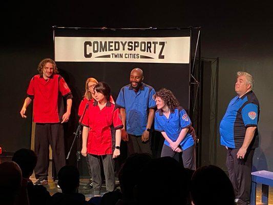 Two teams battle it out in improv comedy based on your suggestions. Fast paced and funny!