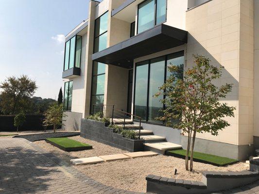 Modern Xeriscape with synthetic turf in metal planters, Rollingwood, Austin