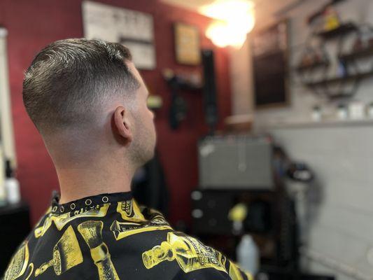 Mid Bald fade and scissor work. You cant go wrong with a nice fade and a short-styled top 
  By barber Manny