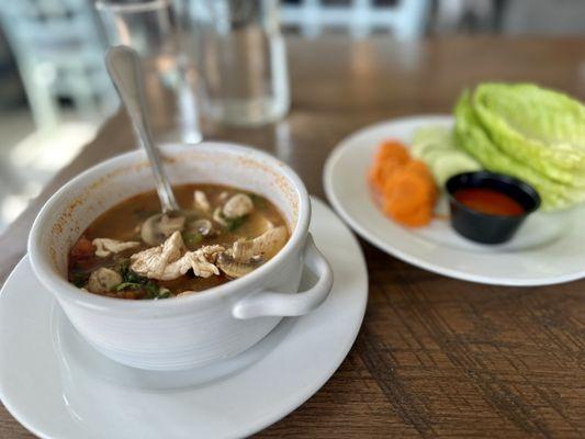 Tom Yum Gai spiced hot and house made Sriracha with locally sourced vegetables.