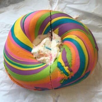 Awesome rainbow bagels with frosting filling only served in Thursdays!