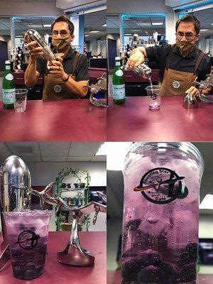 This months signature drink is "Purple Rain". It is a mix of blue Lotus with huckleberry syrup and fresh blueberries in carbonated water!