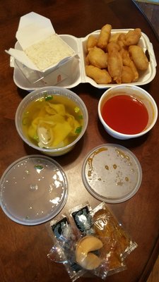 Sweet and sour chicken, wonton soup, and white rice.