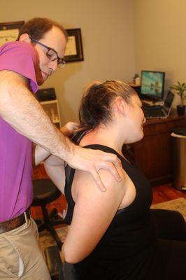 Dr. Scott Heppe using myofascial release to help alleviate pain.