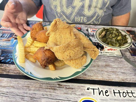 Fried catfish, hush puppies, turnip greens and French fries (not pictured coleslaw)